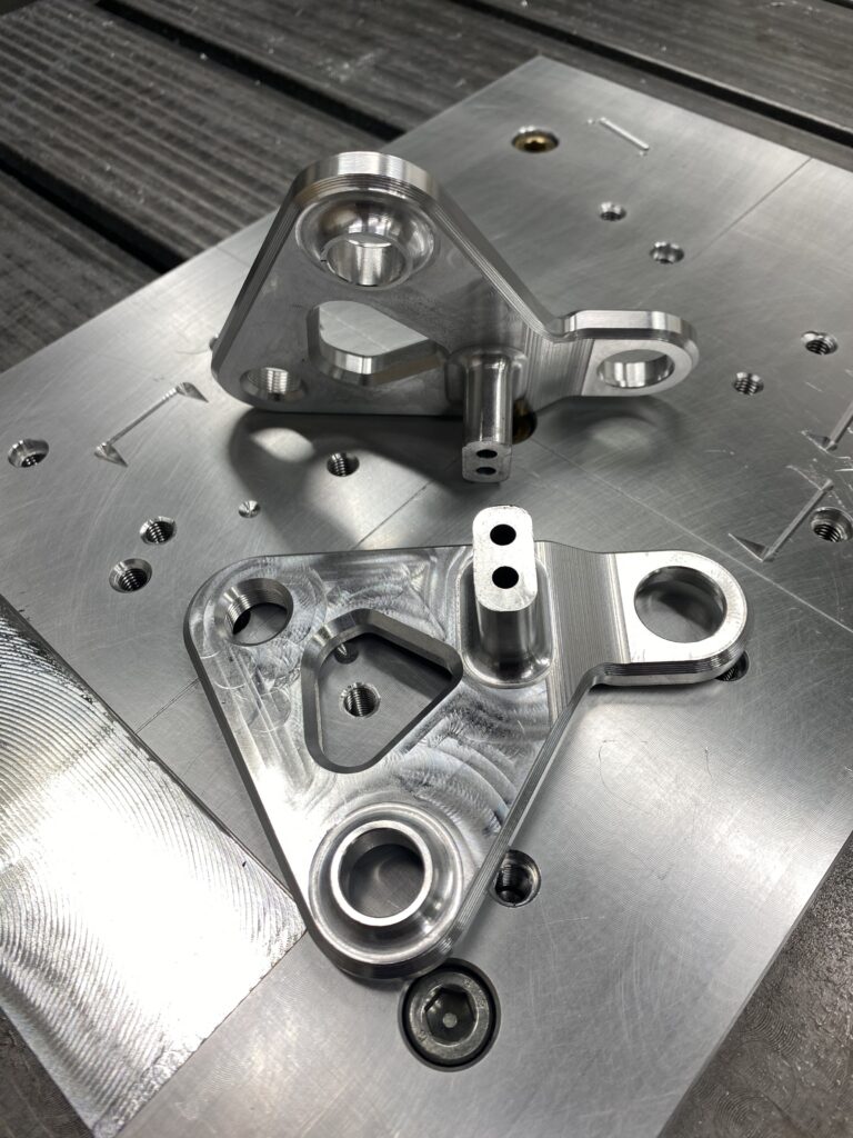CNC milled alumnium 7075 PA9 rocker for prototype version of downhill bike.milled by G Machines